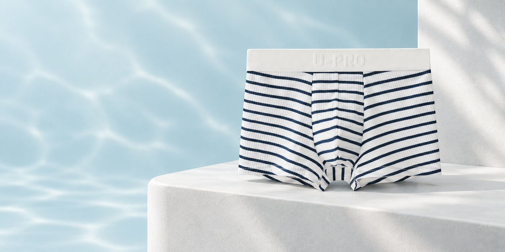 Striped UPRO boxer shorts against a pale blue background